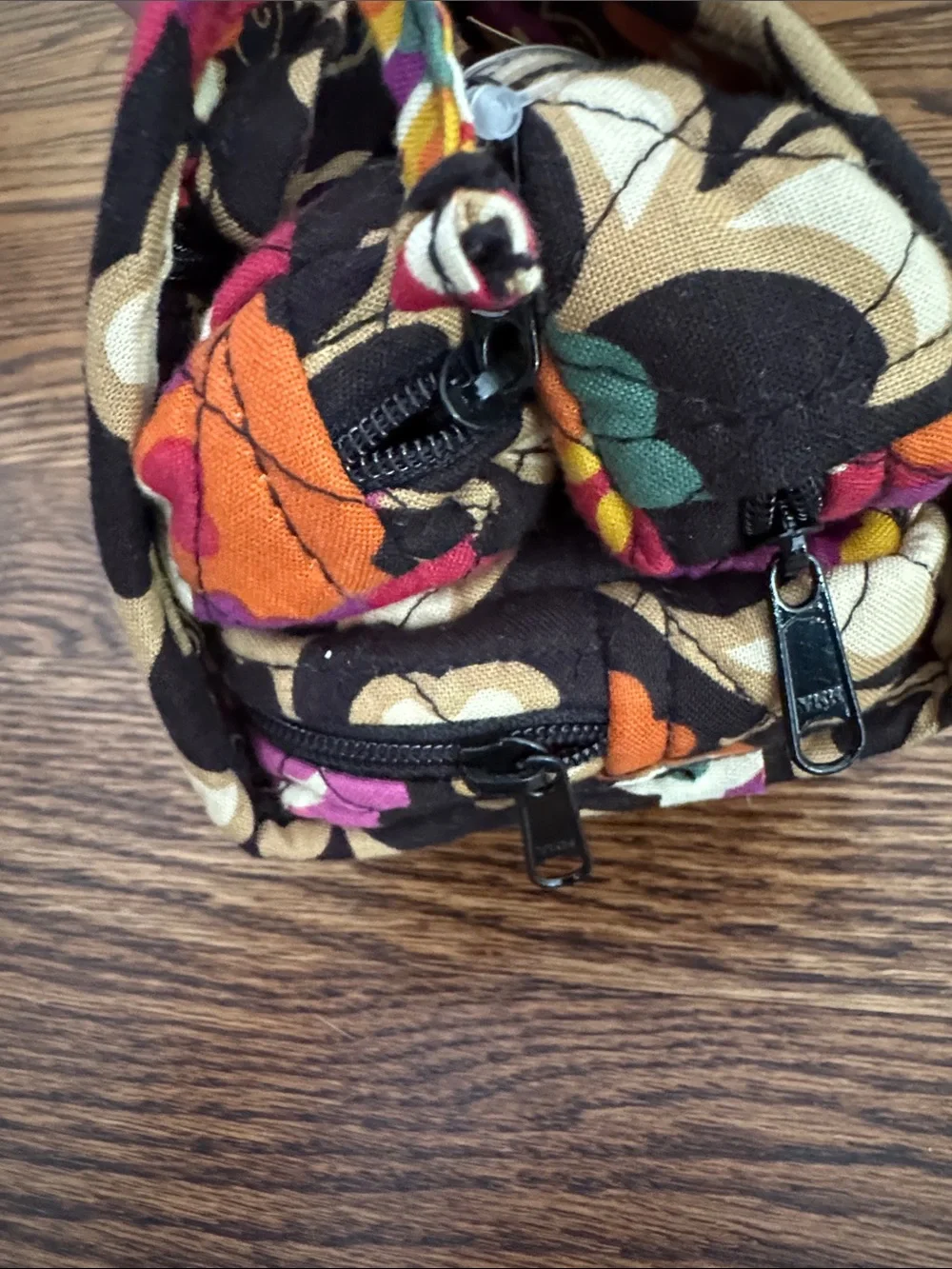 Vera Bradley Suzani pattern quilted rollable stacked zipper pockets tie top bag
